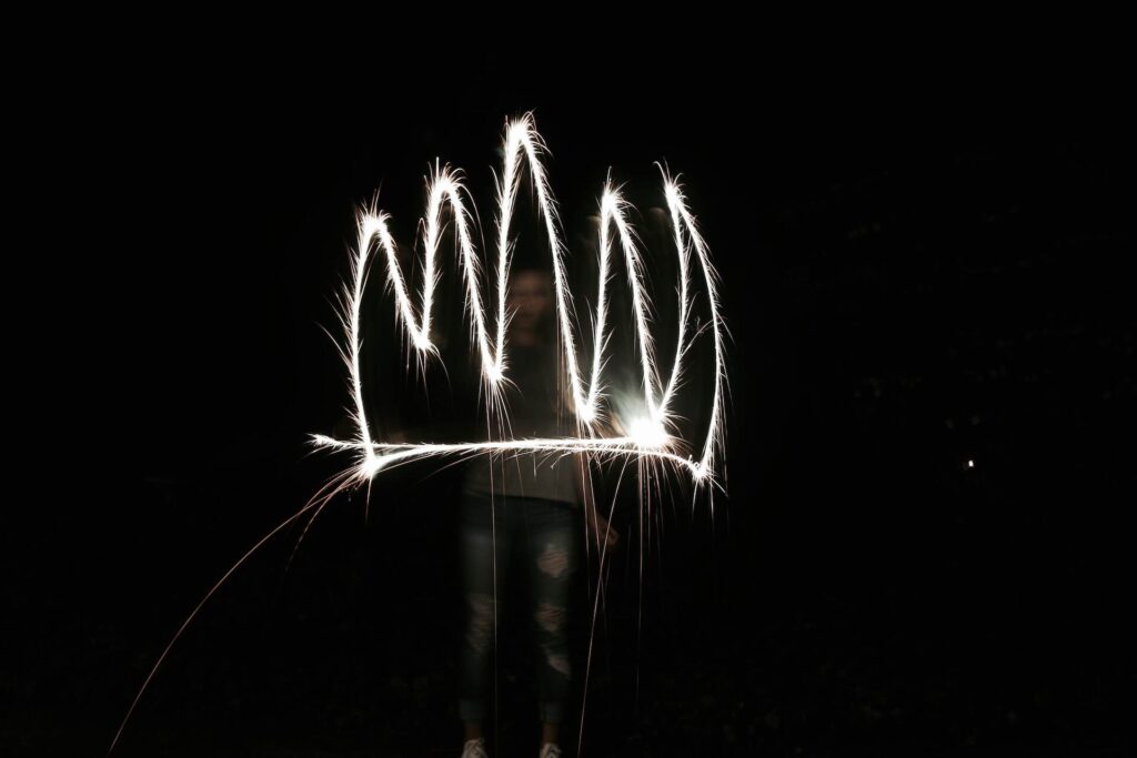 A white crown written in fireworks.