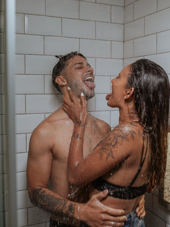 Couple playing in the shower & talking about how to make sex last longer
