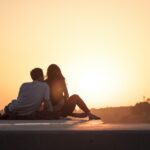 Romantic couple watching the sunset