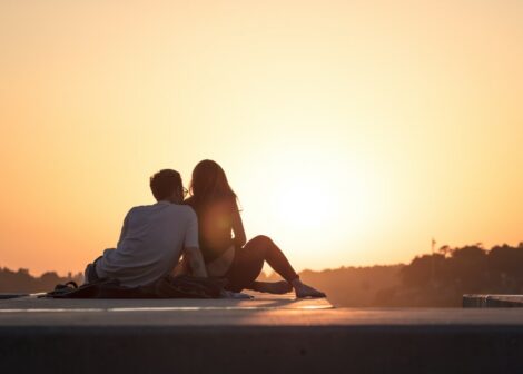 Romantic couple watching the sunset