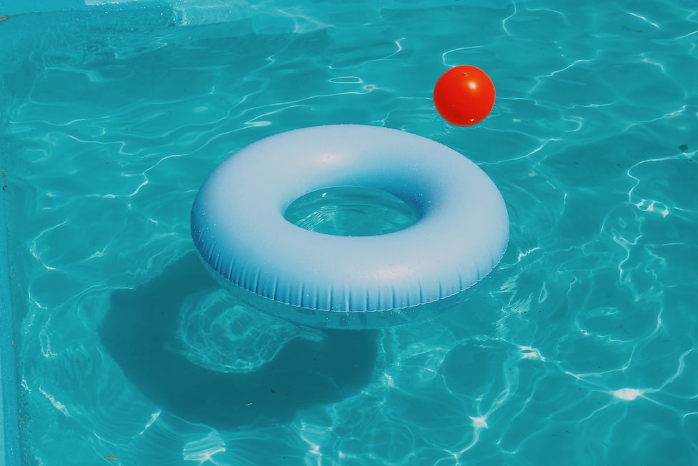 A pool tube floating in a swimming pool