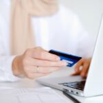 Online shopper buying sex toys online with credit card.